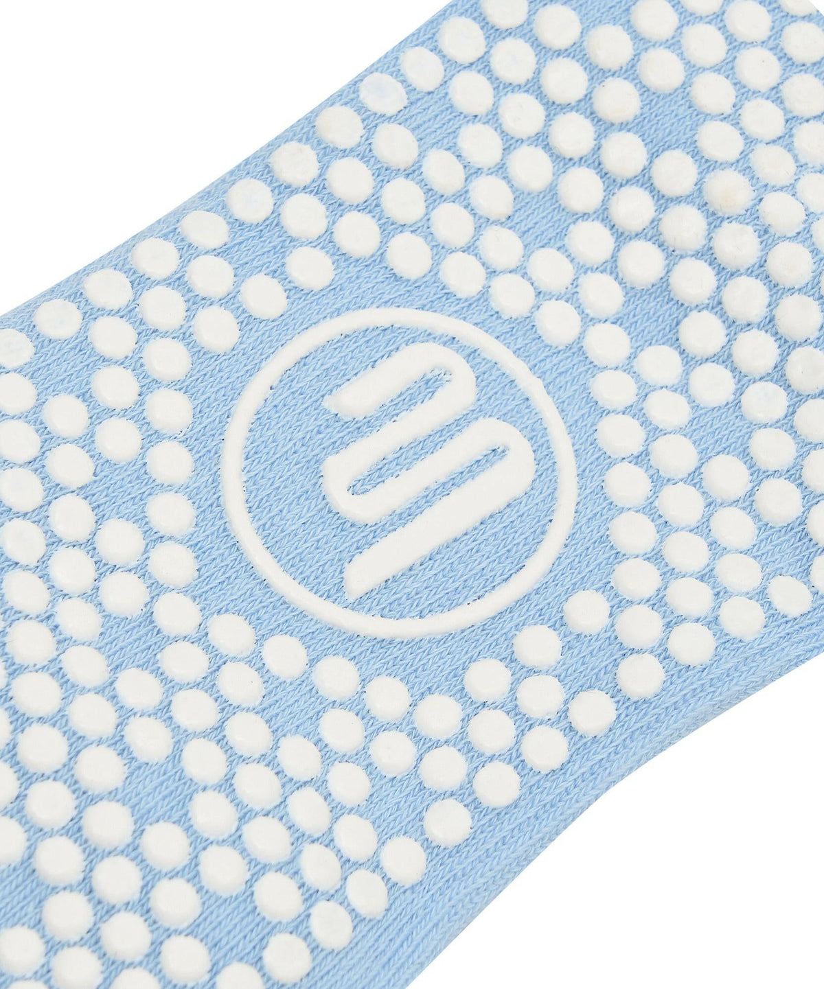 Powder blue striped non-slip grip socks with comfortable crew length design